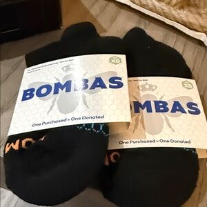 Bombas Black Ankle Socks with Subtle Orange Logo Accents